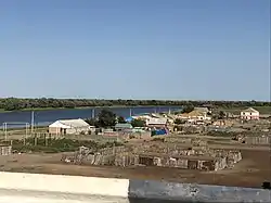 Stary Altynzhar as seen from the bridge across the Kamardan