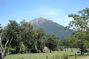 view of some structure on a mountain summit