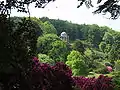 The Temple of Apollo high on a hill overlooking the gardens, based on a circular temple at Baalbec