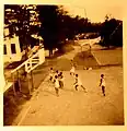 Students playing basketball in the 1950s