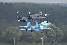 Su-47 next to a Sukhoi Su-35UB at the MAKS-2003 air show.