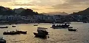 Sunrise behind Yung Shue Wan from the ferry pier