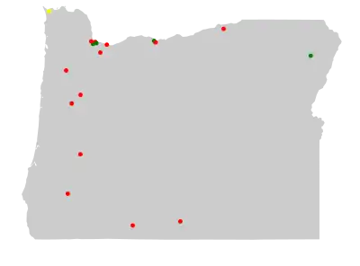 Outline of map of Oregon with colored dots representing the location of Superfund sites in the state