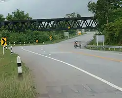 The railway bridge of northeastern rail route crosses over Suranarai Road in Thep Sathit