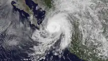 A visible satellite image of Tropical Storm Manuel approaching hurricane intensity just offshore southwestern Mexico on September 18.