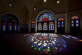 Iranian stained glass designs inside the Tabātabāei House.