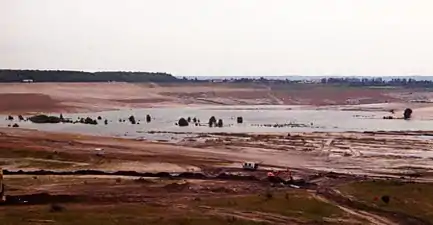 remnants of old pit mine being flooded