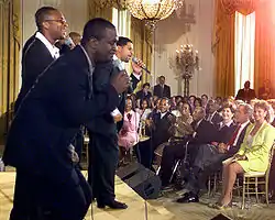 Take 6 performs for U.S. President George W. Bush and First Lady Laura Bush during a Black Music Month celebration at the White House on June 30, 2001