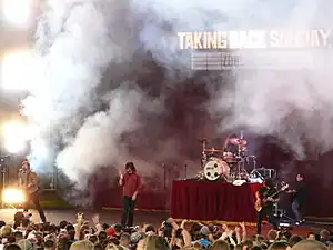 Taking Back Sunday on a smoky stage