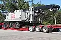 Base section of a Link-Belt 348 HYLAB 5 lattice crawler crane on a lowboy trailer