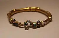 Gold bracelet from the tomb, probably imported from India. National Museum of China