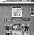 Aarlanderveen station tile sign