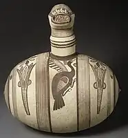 Terracotta barrel jug with strainer, Cyprus, 750-600 BCE.