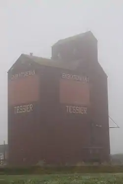 Former Saskatchewan Wheat Pool grain elevator in Tessier on a foggy morning.