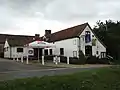 The Bell public house stands on the village green