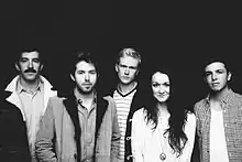 The Paper Kites in 2012.  L–R: David Powys, Sam Bentley, Sam Rasmussen, Christina Lacy, Josh Bentley