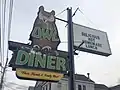 the sign of the diner outdoors