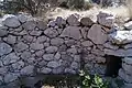 Remains of tholos tomb, south flank of Mount Amalia