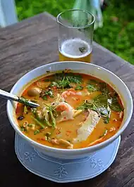 Tom yam soup with fresh coconut meat