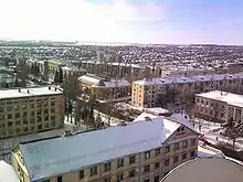 Bird's-eye view of streets and low buildings