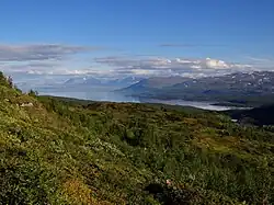 Rohkunborri is located adjacent to Sweden, near the large lake Torneträsk