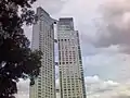 Front view of the El Faro Towers, shot from the river near the two skyscrapers.