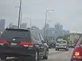 Traffic going southbound on the Kennedy Expressway on a foggy day.