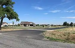 One of the entrances to the Trail Side subdivision — at Trailside Drive and County Road R