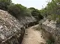 A tram line leading into the battery.