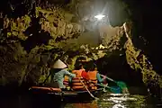 Tourist boat inside a cave.