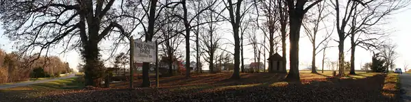 The view southwest toward Tree Spring Farm from the corner of 1450N and 200E.