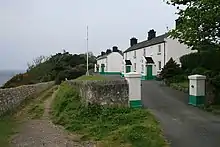 Two pairs of lighthouse keepers' cottages on the Scilly Isles