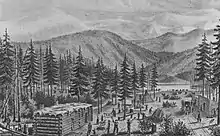 Three log cabins with flat roofs set in the midst of tall trees, with mountains in the background. People, livestock, and covered wagons are engaged in various activities in a clearing in the middle of the cabins.