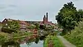 Tulketh Mill and its chimney, as seen from the Lancaster Canal