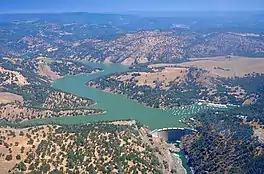 Aerial view of dam and lake