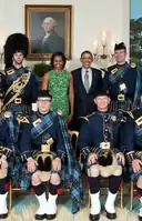 US Air Force Reserve Pipe Band in highland dress (reservist "2001" tartan) with President Barack Obama in the White House Diplomatic Reception Room