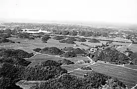 Historical photo showing mogotes near Coto Sur in the Northern Karst.