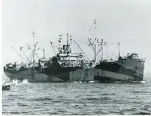 USS Sarasota at Lingayen Gulf in 1945.png