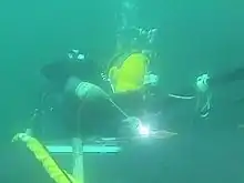 A modern underwater welding.