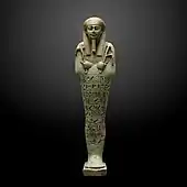 Ushabti; 360–343 BC; ceramic and enamel; 26.7 × 7.1 cm; from Saqqara; Museum of Art and History (Geneva, Switzerland)