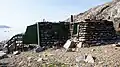 A restored traditional Greenlandic turf house serving the children of Denmark as the 'Santa Claus Castle', where they can write letters.