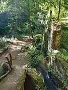 Photograph of a hiking path following a mine work of the Durolle.