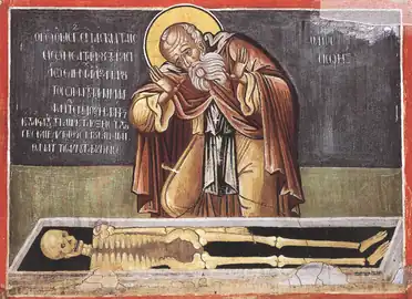 Venerable Sisoës the Great, before the tomb of Alexander the Great, signifying the remembrance of death.