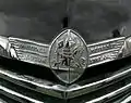 A Vauxhall grillplate from the 1940s showing the Griffin logo