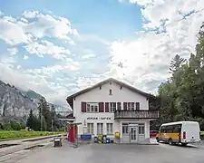 PostAuto departing from the station