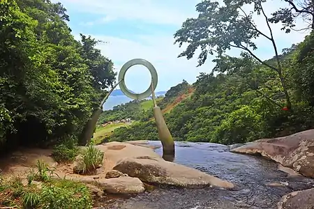 View of the art installation from atop the Bride's Veil waterfall.