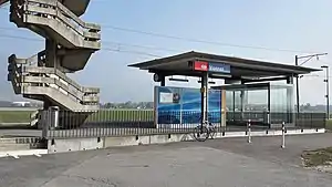 Canopy-covered shelter on a platform