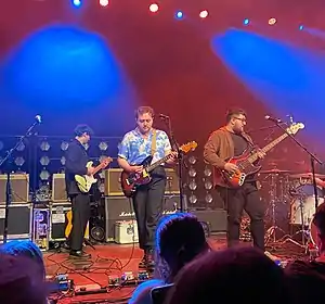 Vistas in concert at Cardiff University Students' Union in 2022; from left to right: Dylan Rush, Prentice Robertson and Jamie Law