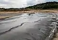 Flowing mud