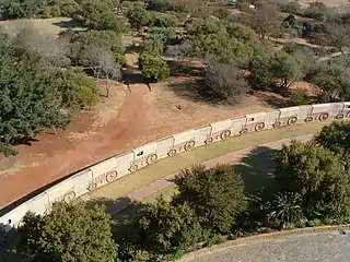 The Voortrekker Monument in Pretoria is encircled by a wall depicting Ox-wagons